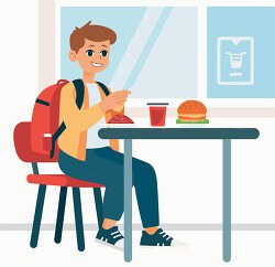 boy sitting at a table Eating lunch in the school Cafeteria