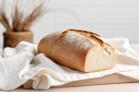 fresh home made bread on white linen cloth